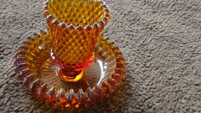 Vintage sharp cut glass candle holder on plate-image