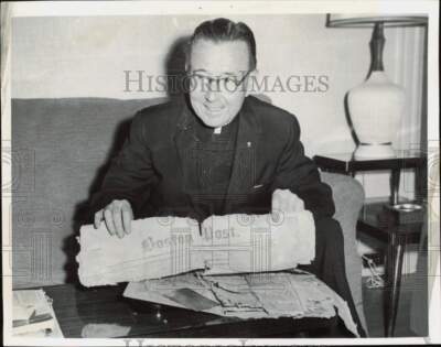 1964 Press Photo Francis Sullivan examines Boston Post taken from cornerstone-image