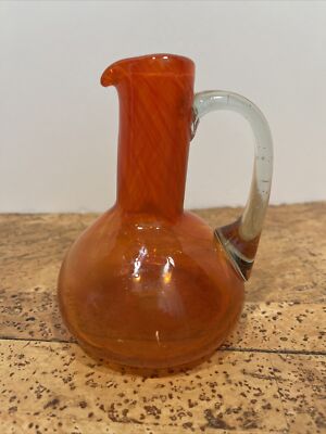 MID-CENTURY MODERN  SWIRL ART  GLASS TANGERINE - ORANGE 5 Inch PITCHER-image