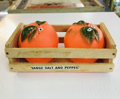 vintage mid-century orange plastic S & P shakers-image