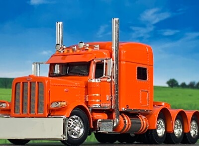 1/64 DCP ORANGE PETERBILT 389 TRI-AXLE W/ 70