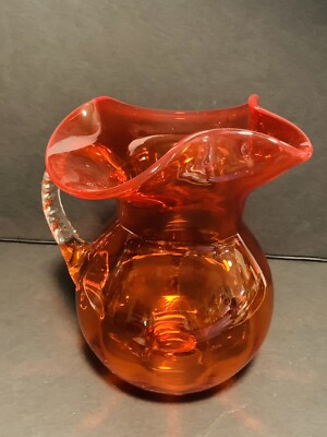 Small Orange Ruffled Rim Water Tea Pitcher Clear Handle Blown Glass Decoration-image