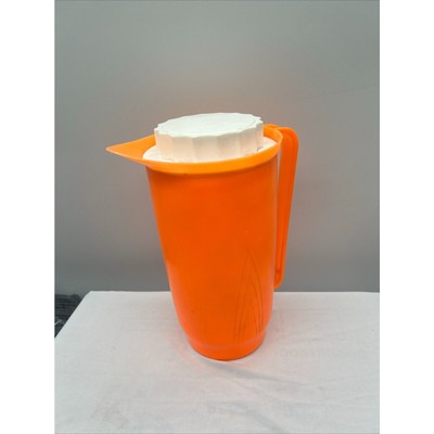 Vintage orange mid-century plastic juice/water container-image