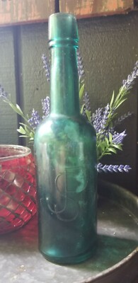 Turquoise Embossed J S P this is by TARRANT & CO. MALT EXTRACT Jos. S. Pedersen-image