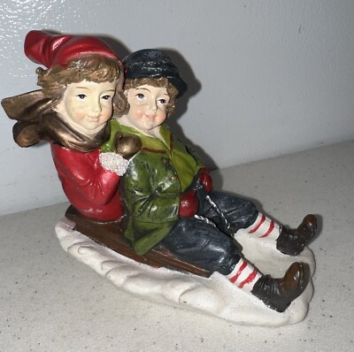 Creative Co-Op Christmas Vintage Resin Children Sled Figurine NBL01B-image