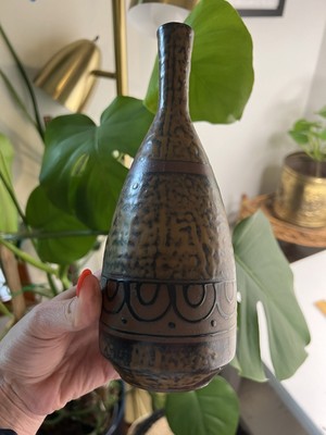 Ceramic vase wide bottom smaller neck that has been repaired Various Browns-image