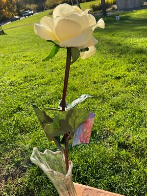 One dozen white artificial long stem roses by Sullivans unopened. Floral-image