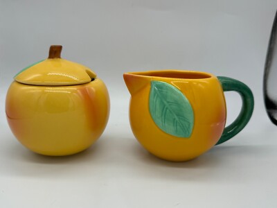 Mid century, orange ( fruit) creamer and sugar bowl-image