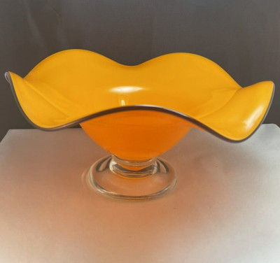 mid century orange glass bowl on clear pedestal black rim-image