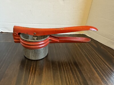 Vintage Metal Potato Ricer Masher Strainer Orange Red Mid Century Rustic Decor-image