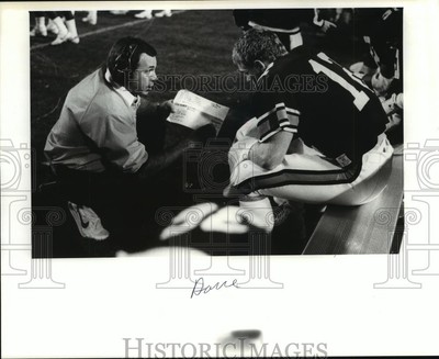 Press Photo Pat Sullivan Coaches Player On Sidelines - ahta02058-image