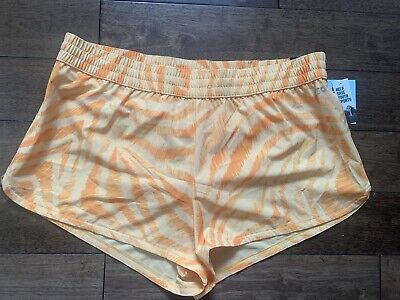 DSG Women's 1X Stride Mid-Rise Run Short Fresh Melon Orange Pickleball-image